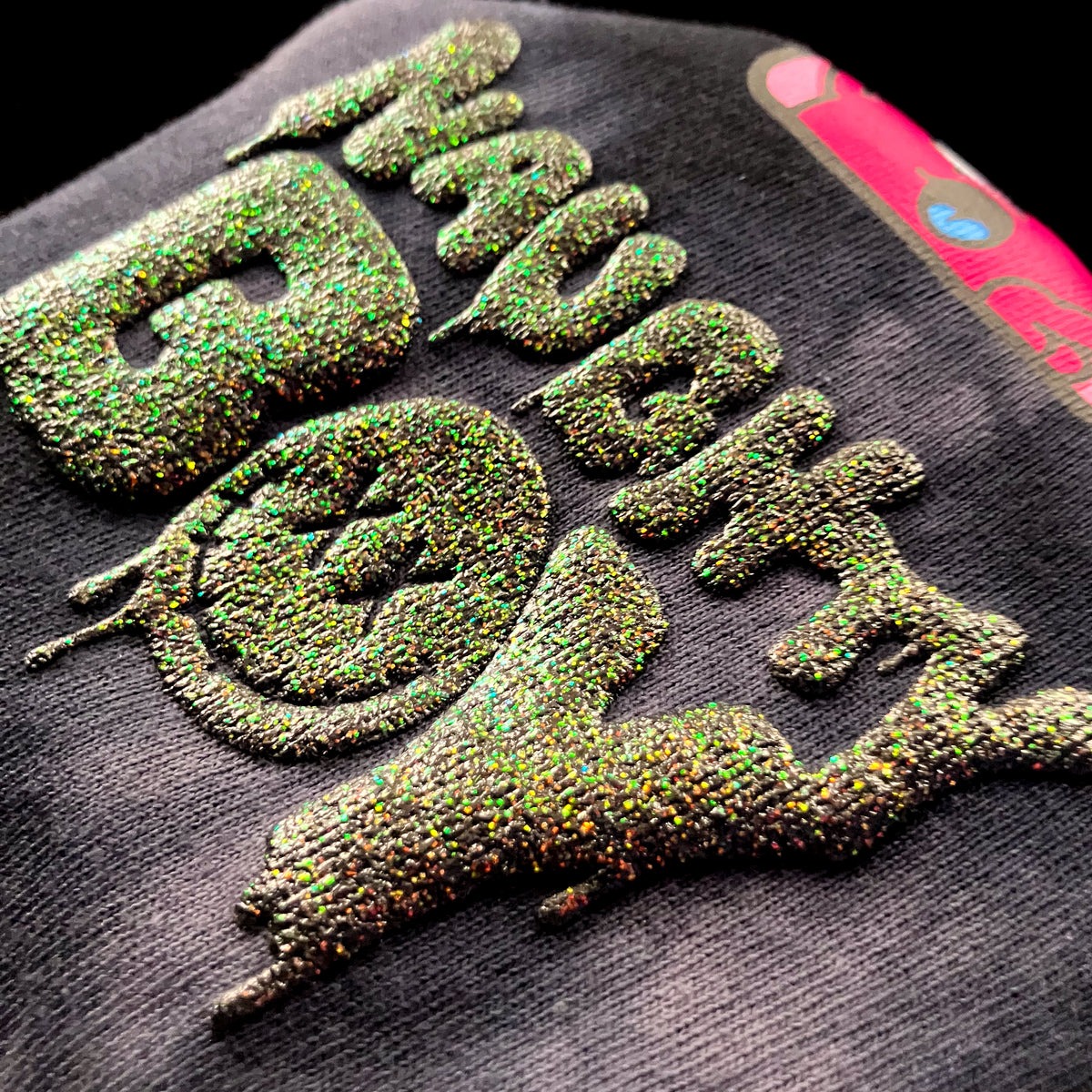 とーる × silkmaster “NAUGHTY BOY Monsters” DTF & Glitter Puff Tie-Dye Tee
